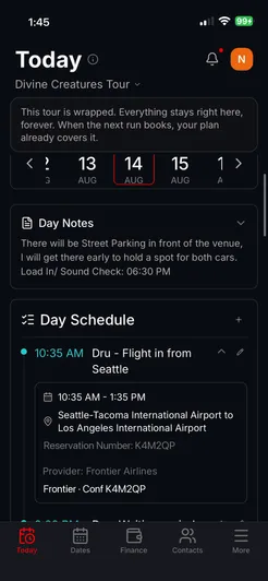 The day sheet for the Los Angeles show in the app: day notes about parking, then the schedule opening with the drummer's 10:35 AM flight from Seattle and its confirmation.